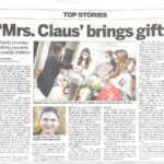 Mrs. Claus' brings gifts Newspaper