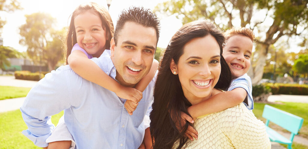 Happy family that has received help from the Hispanic Counseling Center