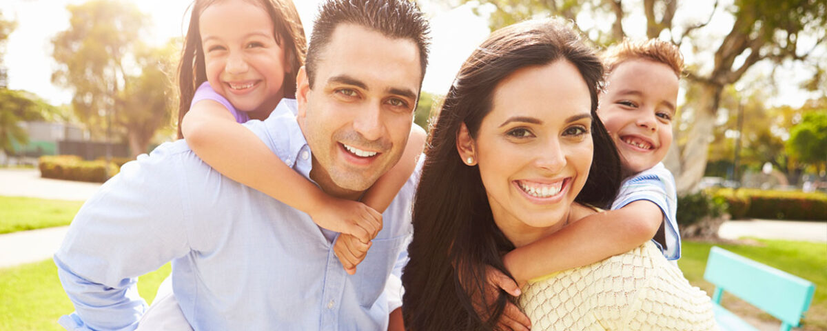 Happy family that has received help from the Hispanic Counseling Center