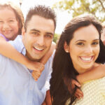Happy family that has received help from the Hispanic Counseling Center