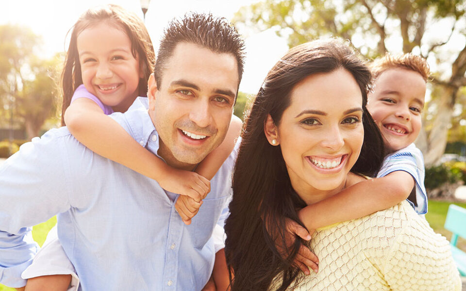 Happy family that has received help from the Hispanic Counseling Center